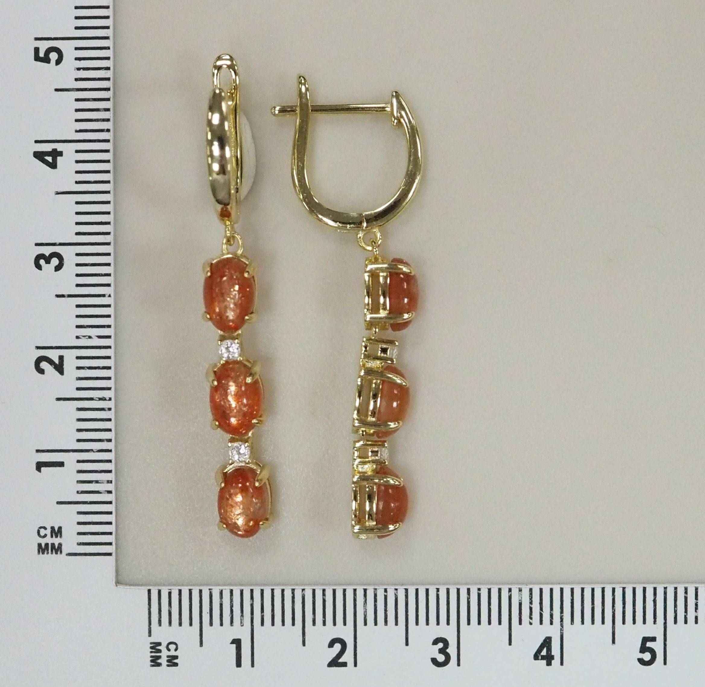 Серебряные серьги с солнечными камнями